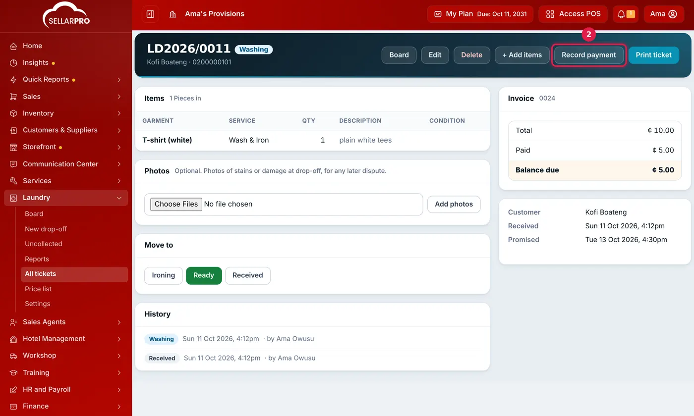 A laundry ticket page with the Record payment button outlined among the buttons at the top